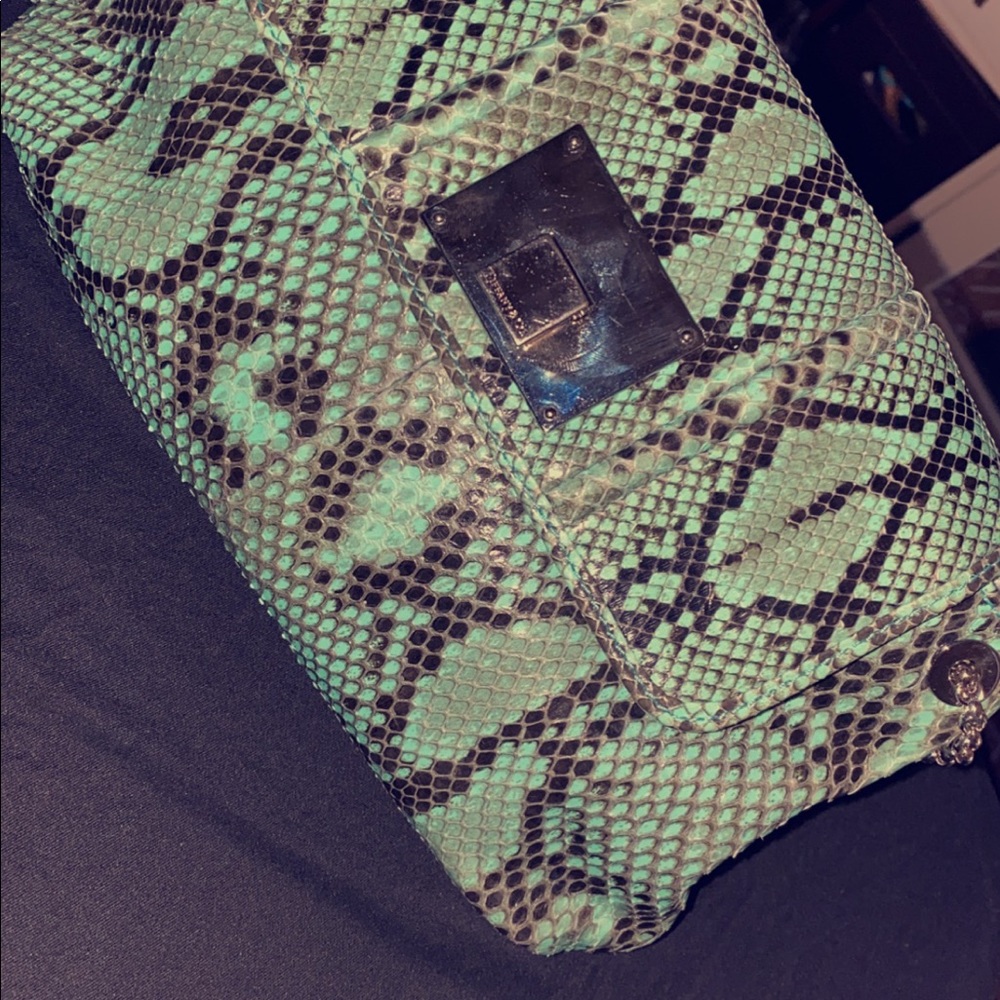Tiffany& Co.  python shoulder bag in blue.